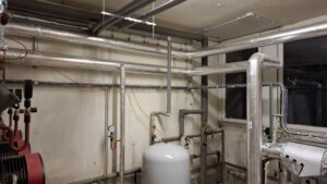 Zvonařka 16, rekonstrukce výměníkové stanice, teplárny Brno. Rekonstrukce horkovodu a páry. Mýnská.